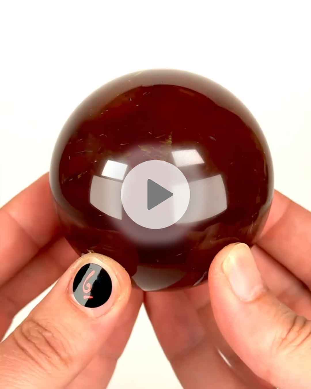 Einzelstueck-Bernstein-Calcit-Kugel-6