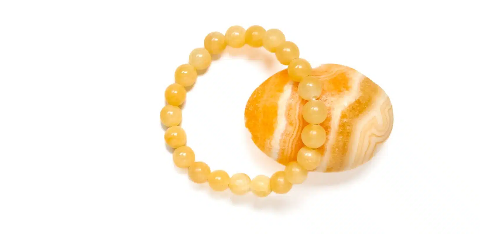 Armband mit Kraftstein-Perlen aus Orangencalcit